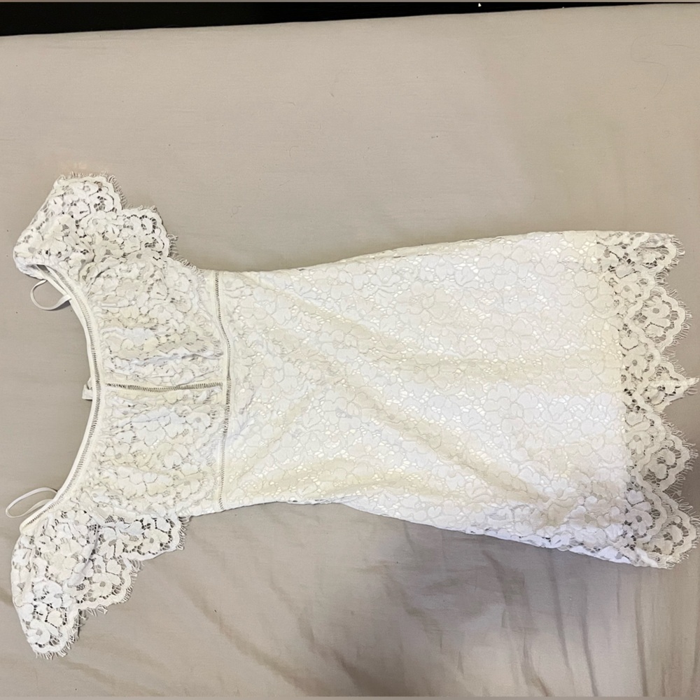Bebe white lace ver the shoulders dress